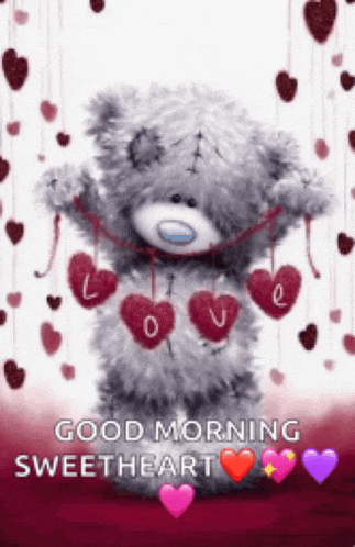 a teddy bear is holding a string of red hearts and says good morning sweetheart .