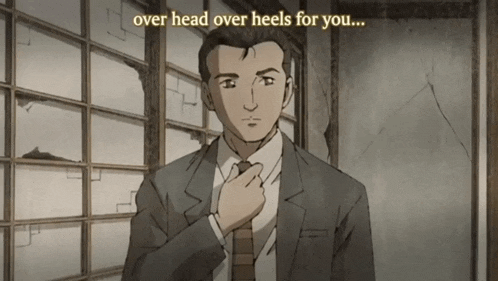 a man in a suit adjusts his tie with the words over head over heels for you below him
