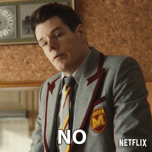 a man in a suit with a patch that says m on it