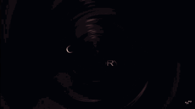 a close up of a circle with the letters n and o on it