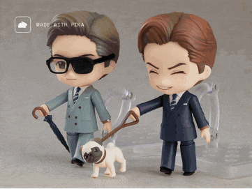 two figurines of men in suits walking a pug on a leash