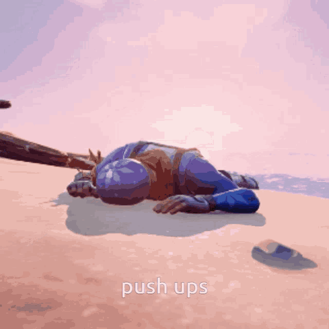 a person laying on the ground with the words push ups written below them