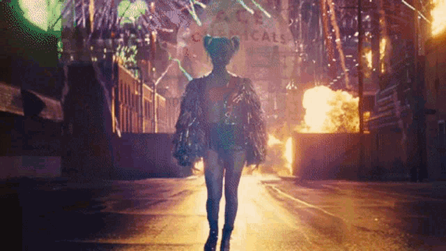 a woman is walking down a street with a sign that says ace chemicals in the background