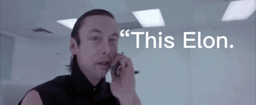 a man talking on a cell phone with the words " i 'm a robot " in the background