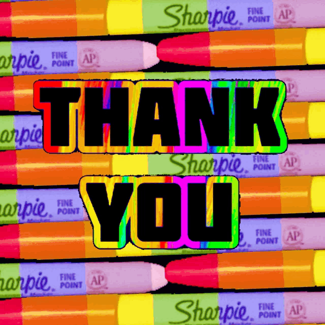 a row of sharpie fine point markers are lined up in a row