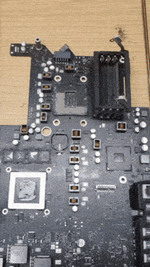 a computer motherboard with a cpu socket and a ram socket