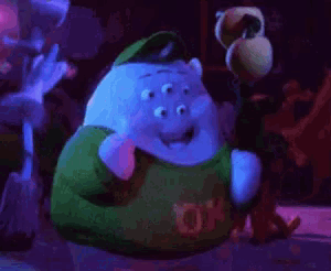 a cartoon character wearing a sweater that says ok