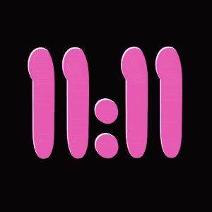 a black background with pink numbers and sprinkles that says 11:11