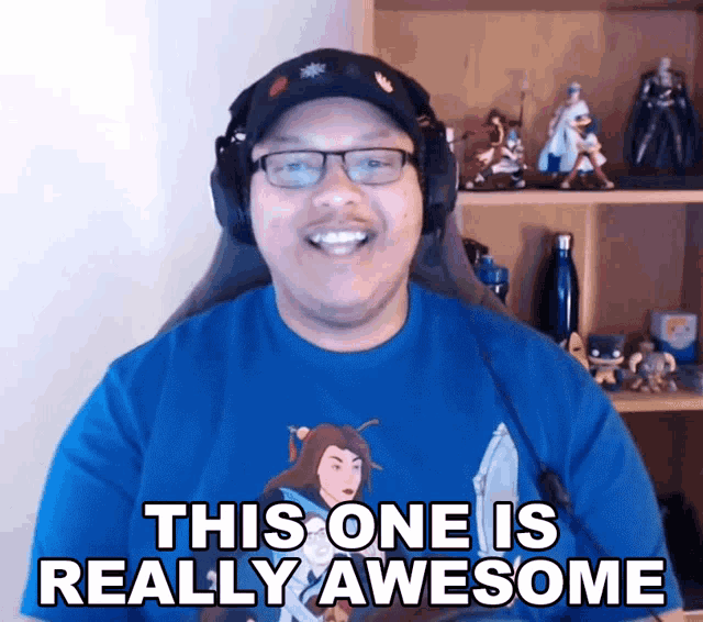 a man with glasses and a blue shirt says this one is really awesome