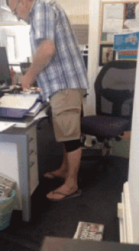 Air Horn Under The Chair Prank GIF