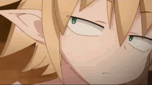 a close up of a cartoon character 's face with a serious look on his face