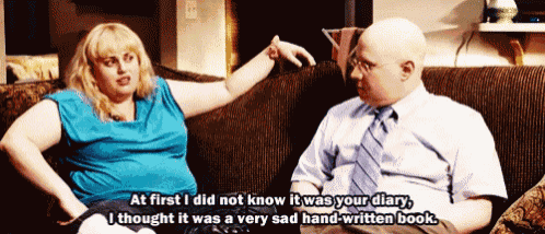 a man and a woman are sitting on a couch and the woman says " at first i did not know it was your diary