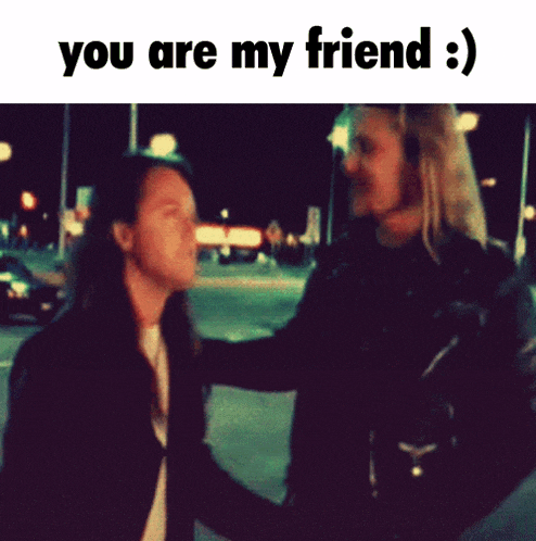 a picture of a man hugging a woman with the caption " you are my friend :) "