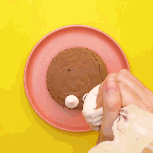 a cake with whipped cream on top of it on a plate