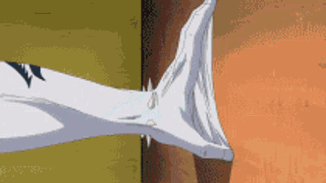 a close up of a person 's arm with a white cloth covering it