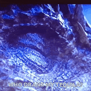 a close up of a person 's face with the words `` who drank my tequila '' written on it .