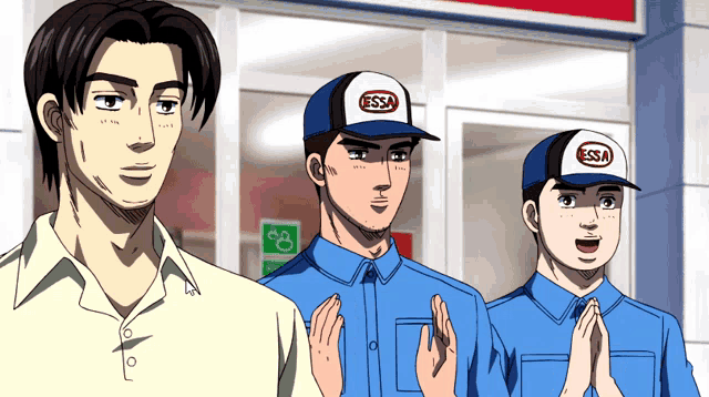 a group of men wearing blue shirts and hats with the word esso on them