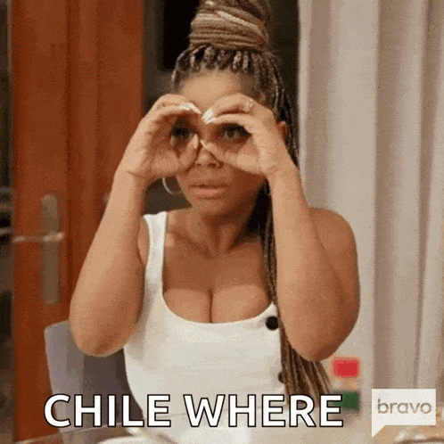 a woman in a white tank top is looking through binoculars with the words chile where written on the bottom