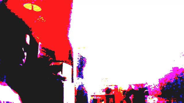 a very colorful image of a person standing in front of a red building