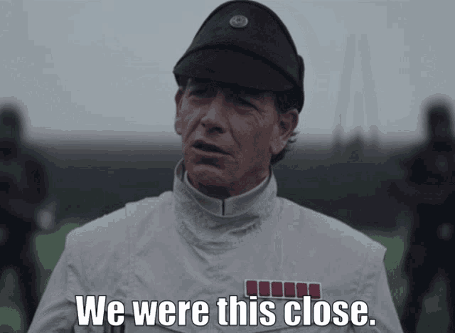 a man in a star wars uniform is saying we were this close
