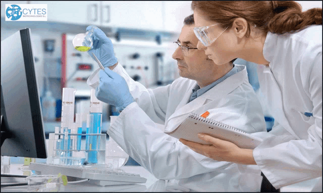a man and a woman are working in a lab with a logo for cytes