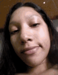 a close up of a woman 's face without makeup