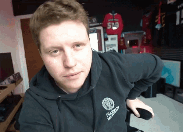 a man wearing a black hoodie with the word franklin on the front