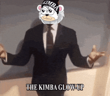 a man in a suit with a kimba hat on his head says the kimba glow-up