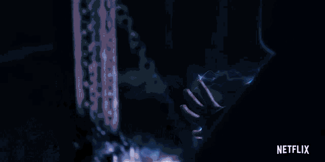 a person is holding a lightning bolt in their hand with netflix written on the bottom