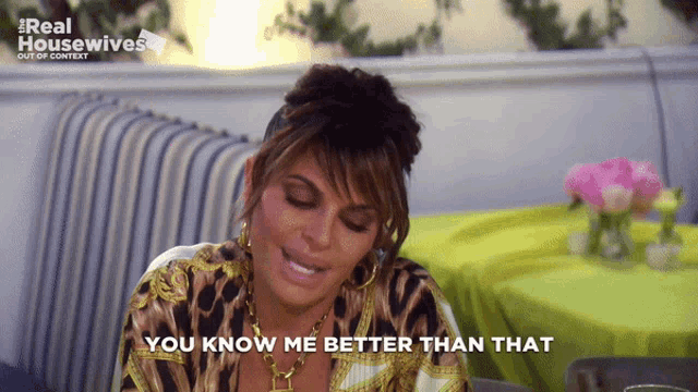a woman says " you know me better than that " in front of a table