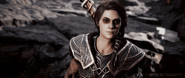 a screenshot of a video game shows a woman holding a spear