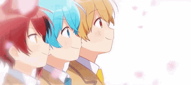 a group of three anime characters are standing next to each other and smiling .