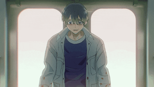 a man in a white jacket and a blue shirt is standing in front of a window
