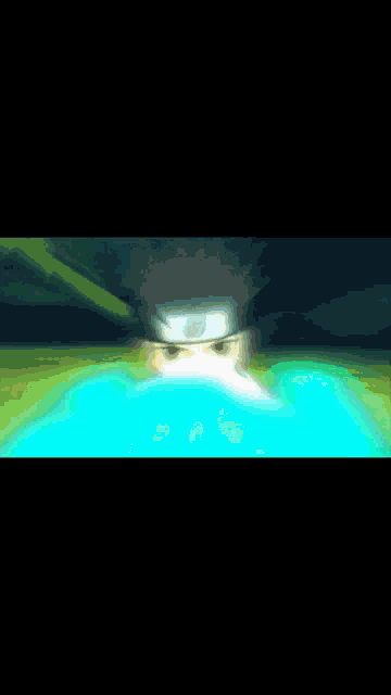 a blurred image of a green and blue background with a few lines