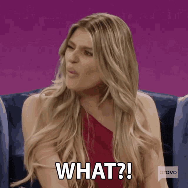 a woman sitting on a couch says what