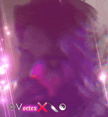 a close up of a man 's face with a beard in a purple light