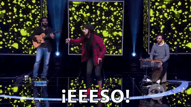 a group of people are standing on a stage with the words eeeso written on the bottom .