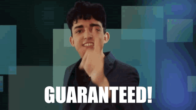 a man in a suit giving the middle finger with the words guaranteed behind him