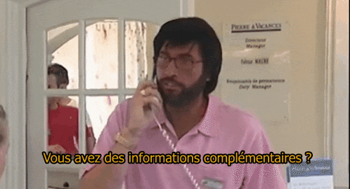 a man in a pink shirt is talking on a phone with vous avez des informations complementaires written on the bottom