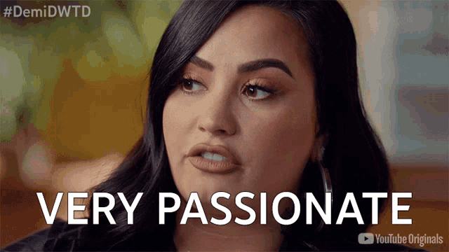 a close up of a woman 's face with the words very passionate on the bottom