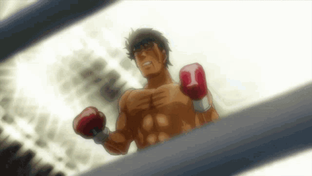 a man wearing red boxing gloves with the number 1 on his fist