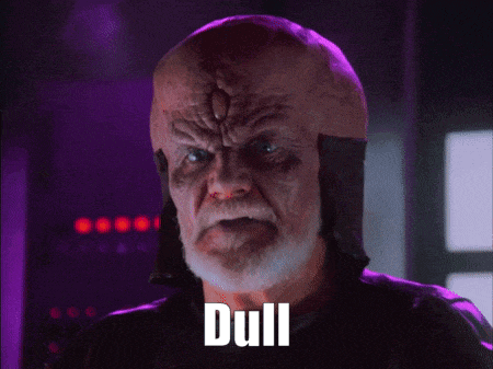 a bald man with a beard has the word muffled written on his face
