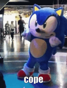 a sonic the hedgehog mascot is dancing in a room with people walking around