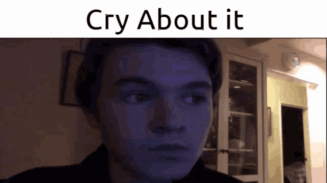 a young man is looking at the camera with the words cry about it below him