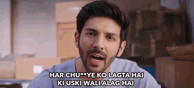 a man with a beard is making a funny face with a caption that says har chu ye ko lagta hai