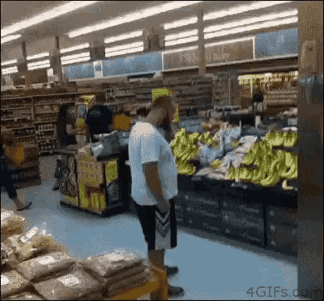 Guy Flying Into Other Guy Falling Over In Supermarket Flying GIF - Guy Flying Into Other Guy Falling Over In Supermarket Flying GIFs