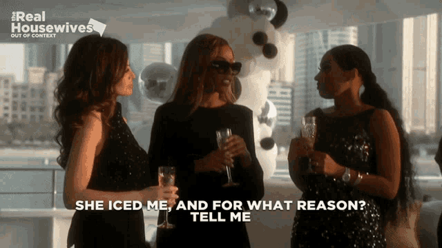 a real housewives advertisement shows three women holding champagne glasses
