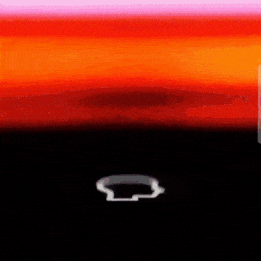 a chevrolet logo is displayed in front of a sunset sky