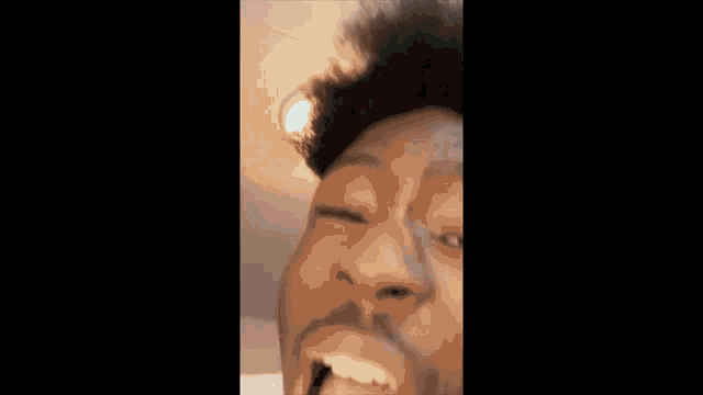 a close up of a person 's mouth and nose with a blurred background