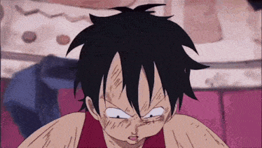 monkey d luffy from one piece is making a funny face with his hands on his head .